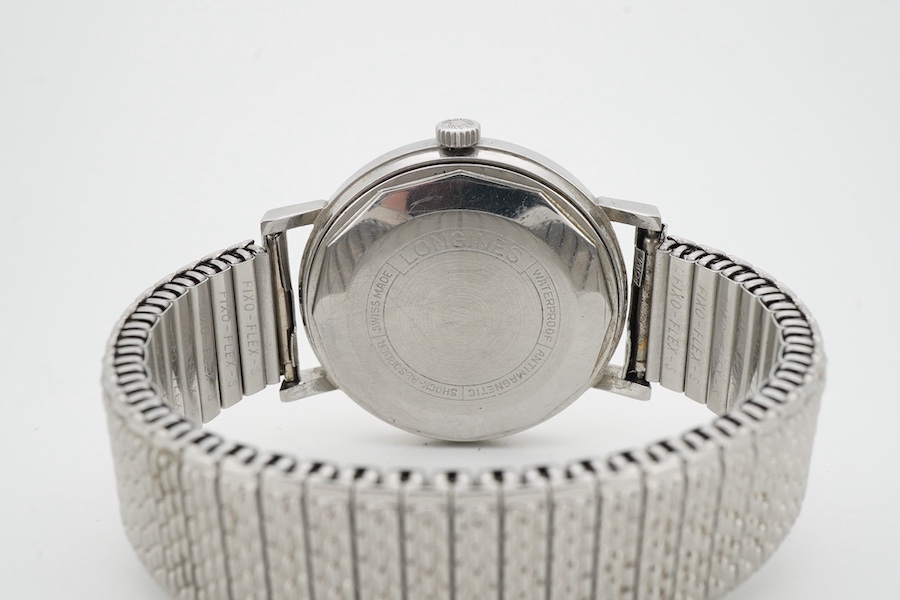 Longines, a stainless steel automatic wristwatch, ref.7844-3, 1960s, circular brushed silvered dial with baton indicators and date wheel aperture, dial and movement signed Longines, case back interior signed Longines, nu